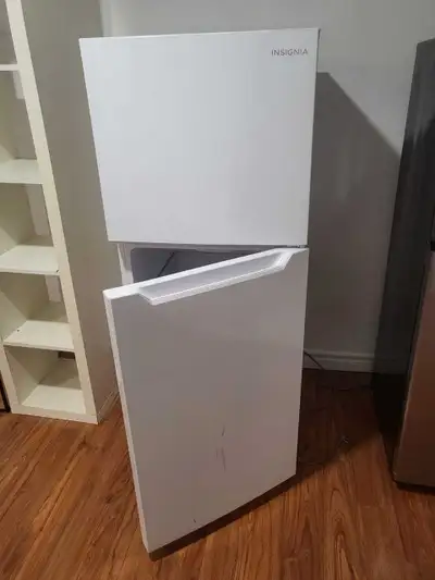 Brand new fridge. Pick up only. Hamilton. Cash only. Insignia 10 cu. ft. Top Freezer Refrigerator. M...