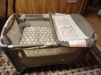 Portable Nursery Center Baby Trend Pack and another Playpen