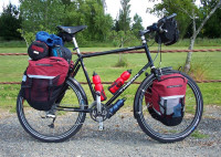 Wanted:  Touring bicycle capable of a long distance ride