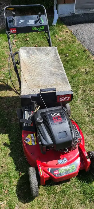 An iconic lawnmower from Toro. This was the top-tier model back in the day, with a cast aluminum dec...