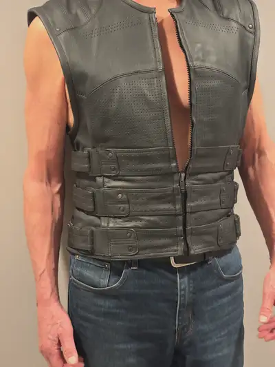 Men's exceptional condition like new leather vest. Triple adjustable straps. Size M/L. Brand is Spee...