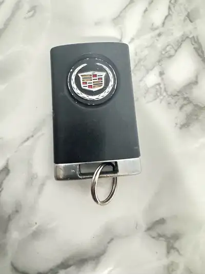 Pick up in Cambrige Sold my 2011 Cadillac SRX where this was an extra key. No longer needed