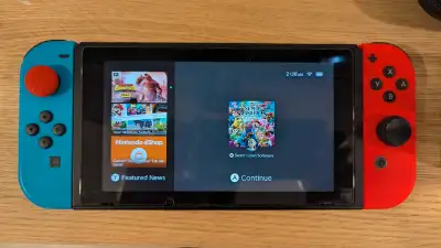 Nintendo Switch + Pro controller, View more