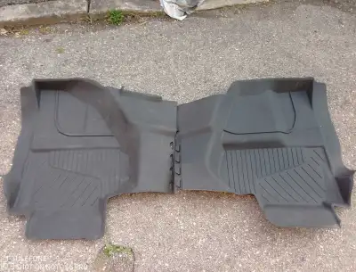 I'm selling a pair of rear floor mats specifically designed for a 2018 GMC Sierra. These mats are ne...
