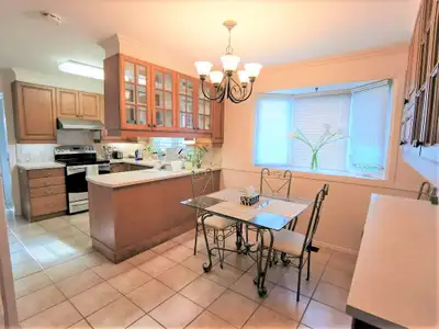 This is a quiet clean all hard wood floor bright house with 3.5 bathrooms to share. It is a nice lar...