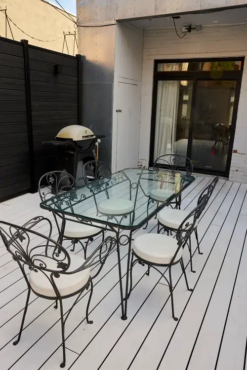 Beautiful 1980 patio set with 6 chairs. 2 chairs with armrest and 4 chairs without. Solid iron. It h...