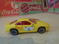 Petite voiture 1992 BMW jaune coca-cola