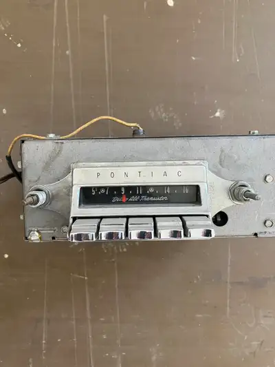 Pontiac car radio, untested. I do not know the model or year of car it fits. Central Huron County. C...