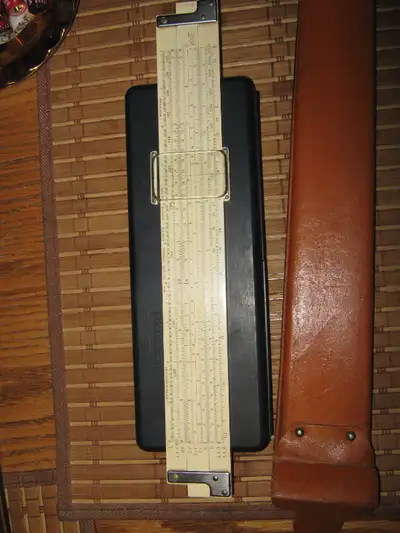 Keuffel & esser slide rule w/case, View more
