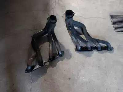 hedman headers from my 61 chev bbc. never seen the road used to fire my motor paid 600 sell for 300....
