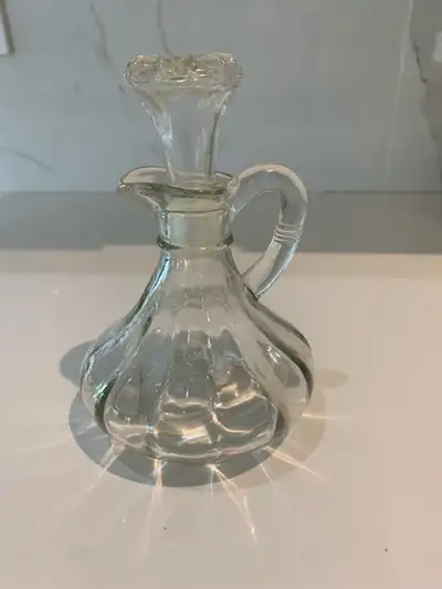 Vintage glass cruet with glass stopper., View more