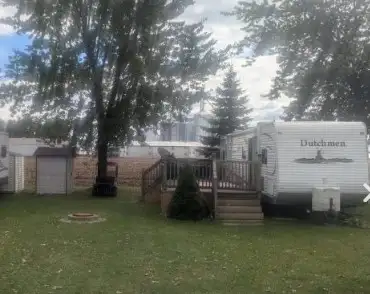 Look no further then this 2010 39′ Dutchman 2 bedroom trailer currently stored on an expansive lot a...