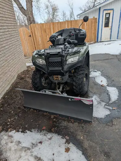 Honda Rancher for sale. Has 2240km, 131 hours. Mainly used to plow the driveway and occasional trail...