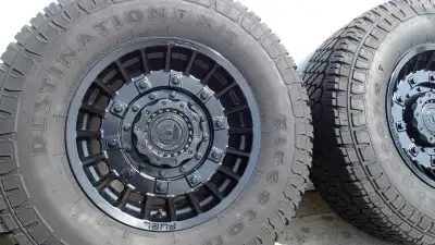full set of 4 wheels and tires mounted balanced and ready to put on your vehicle wheels are FUEL MIL...