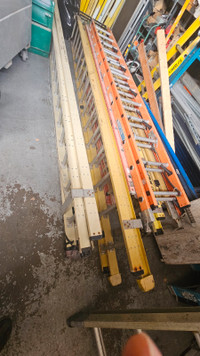 Used fiberglass extension ladders for sale.