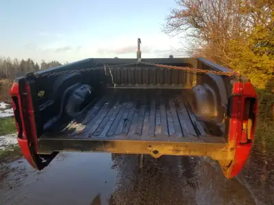 Its an ok truck box. 6 and a half foot. Line X bed liner. Hardware included. Came off a 2008 1500 la...