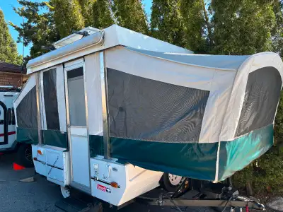 Fully refurbished 2002 Taos. Canvas is in excellent condition with only one small patched hole in th...