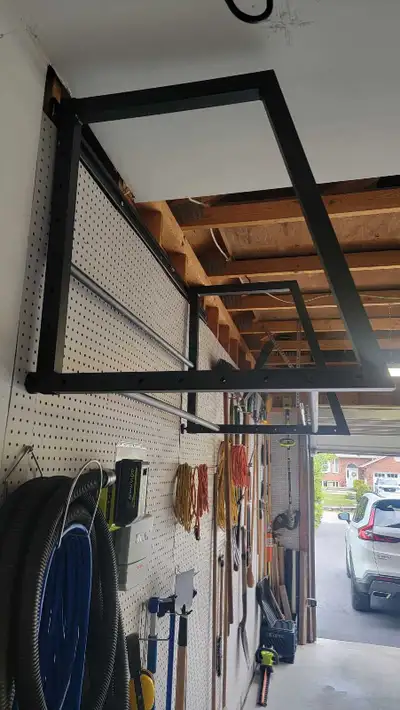 Adjustable heavy duty rack to store tires up out of the way. Easy assembly.