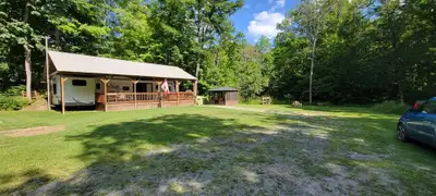 42’ Forest River travel trailer (2015 model, 4 tip-outs, sleeps 10). Enjoy peace, privacy, and all t...