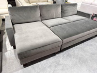 Brand new fabric sectional with large storage ottoman