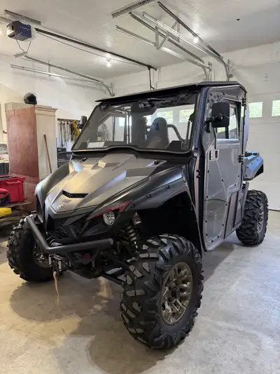 Full cab with front glass window with wiper and spray. Heater with 3 speed switch