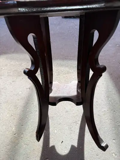 Wooden table with a broken leg, View more