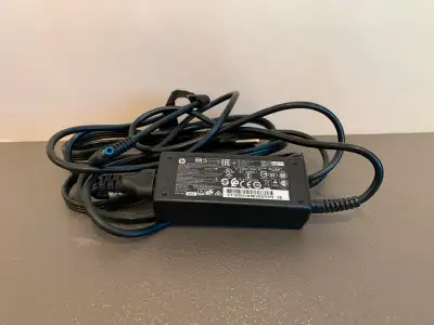 HP Charger for laptops and other HP devices with supply cable, View more