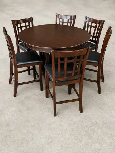 dining table and seven chairs., View more