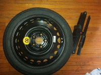 T125/70 r16  spare tire Brand new with scissor jack 