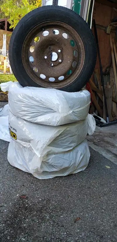 Set of 4 Kumho winter tires on rims. 205/55 R16. Bolt pattern is 5x112 and the bore is 66.5. Manufac...