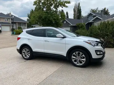 2014 Santa Fe sport 2.0T AWD Limited. Clean and in good condition. New rubber and brakes. Additional...