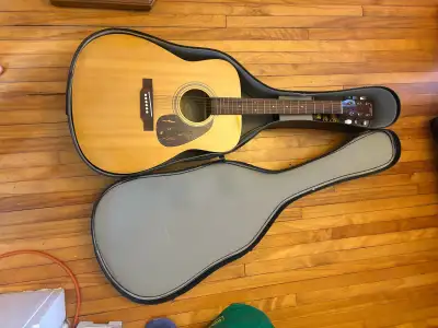 Acoustic guitar with case, View more