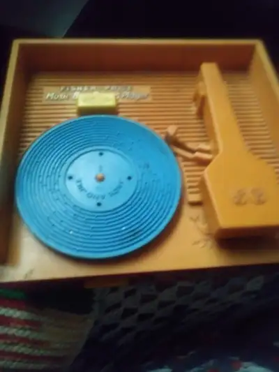 Vintage Fisher Price record player, View more