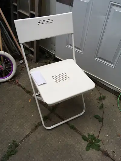Linwood Street in St James. Three chairs, new. All for $45.