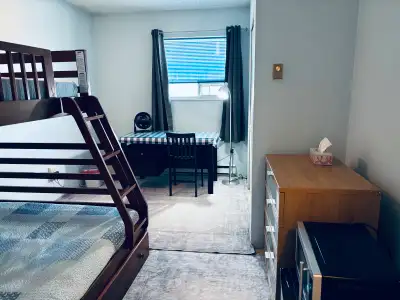 One upstairs bright and clean bedroom is ready for a single young man. Close to everywhere. 2 minute...
