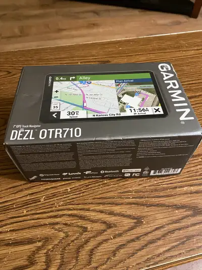 For sale is a Garmin dezl OTR710 GPS truck navigator with a 7-inch display, designed for professiona...