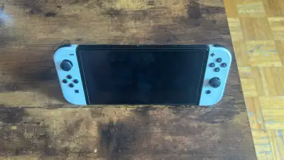 OLED Nintendo Switch with accessories , View more