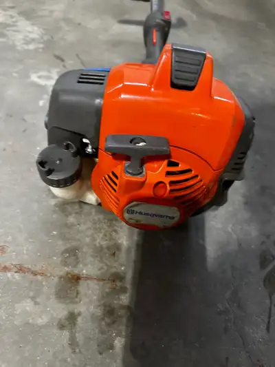 Husqvarna 322L Trimmer. Just bigger than what I need went to electric. Needs to go in for spring ser...