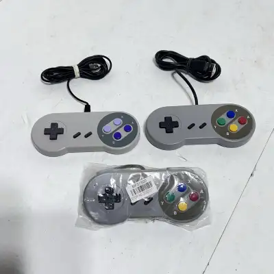 Get ready to level up your retro gaming with these SNES USB controllers! This set includes three cla...