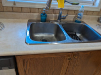Looking for someone who can do kitchen countertops and sink.