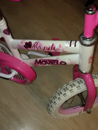 Girls bicycle with training wheels, View more