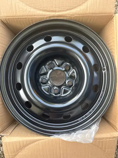 I am selling 4 new RNB steel 16-inch rims with a 5x114.3 bolt pattern, a 64.1mm hub, and a 40mm offs...