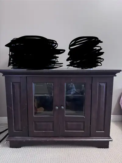 TV table with storage. It also has extra storage from the sides. In good sturdy condition but has so...