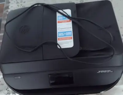 HP OfficeJet 4650 wireless all-in-one printer in good condition., View more