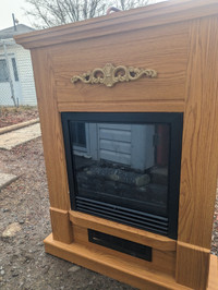 2 electric fireplaces and 1 electric room heater needing repair