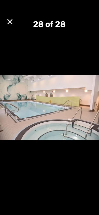 RIVER DISTRICT | SPACIOUS 2 BEDROOM + DEN | AIR CONDITIONING | PARKING + STORAGE | 1 WEEK FREE Move...