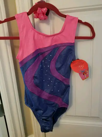 1. Size 10/12 new Danskin Freestyle bodysuit. 2. Size 12/14 new Body Wrappers gymnastics suit. 3. Si...