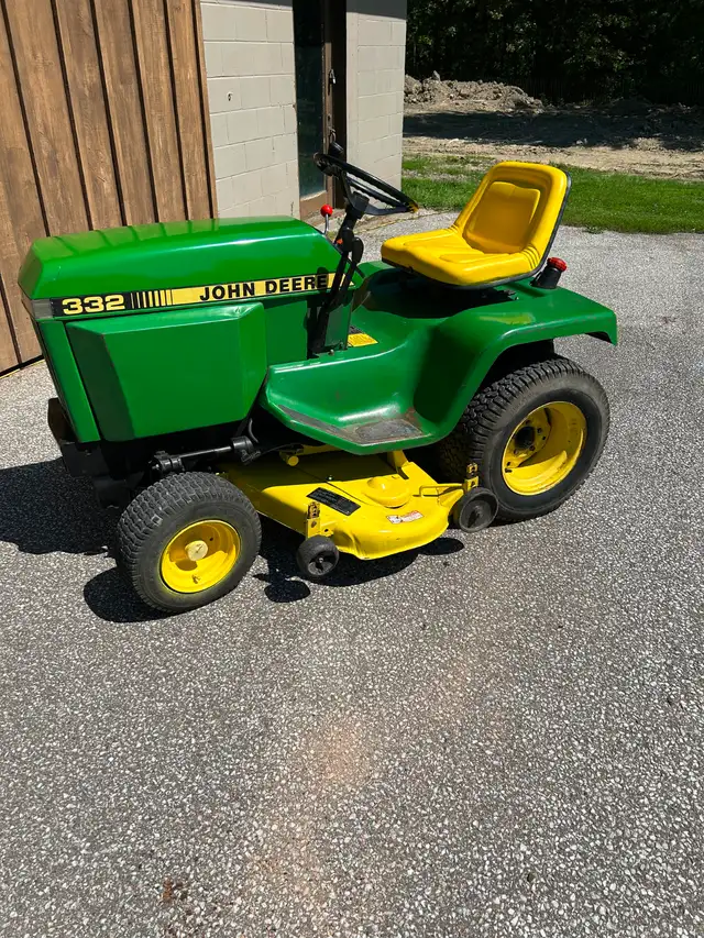 John Deere 332 garden tractor with attachments for sale
