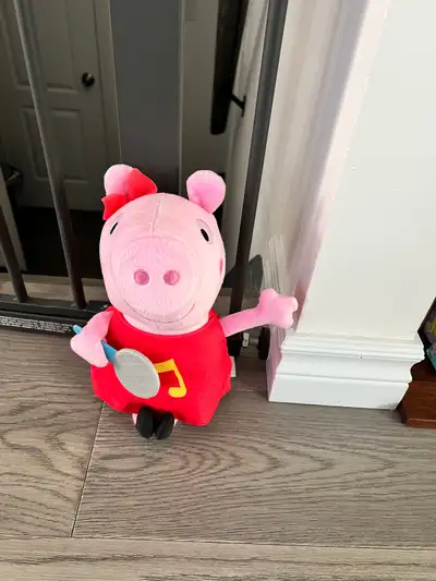 Never used Peppa Pig toys. Peppa Pig singing toy sings when button is pushed.