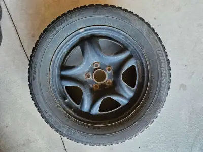 A set of 4 used Bridgestone Blizzak LM-50 RFT P225/60R17 98Q on Steel Rims
